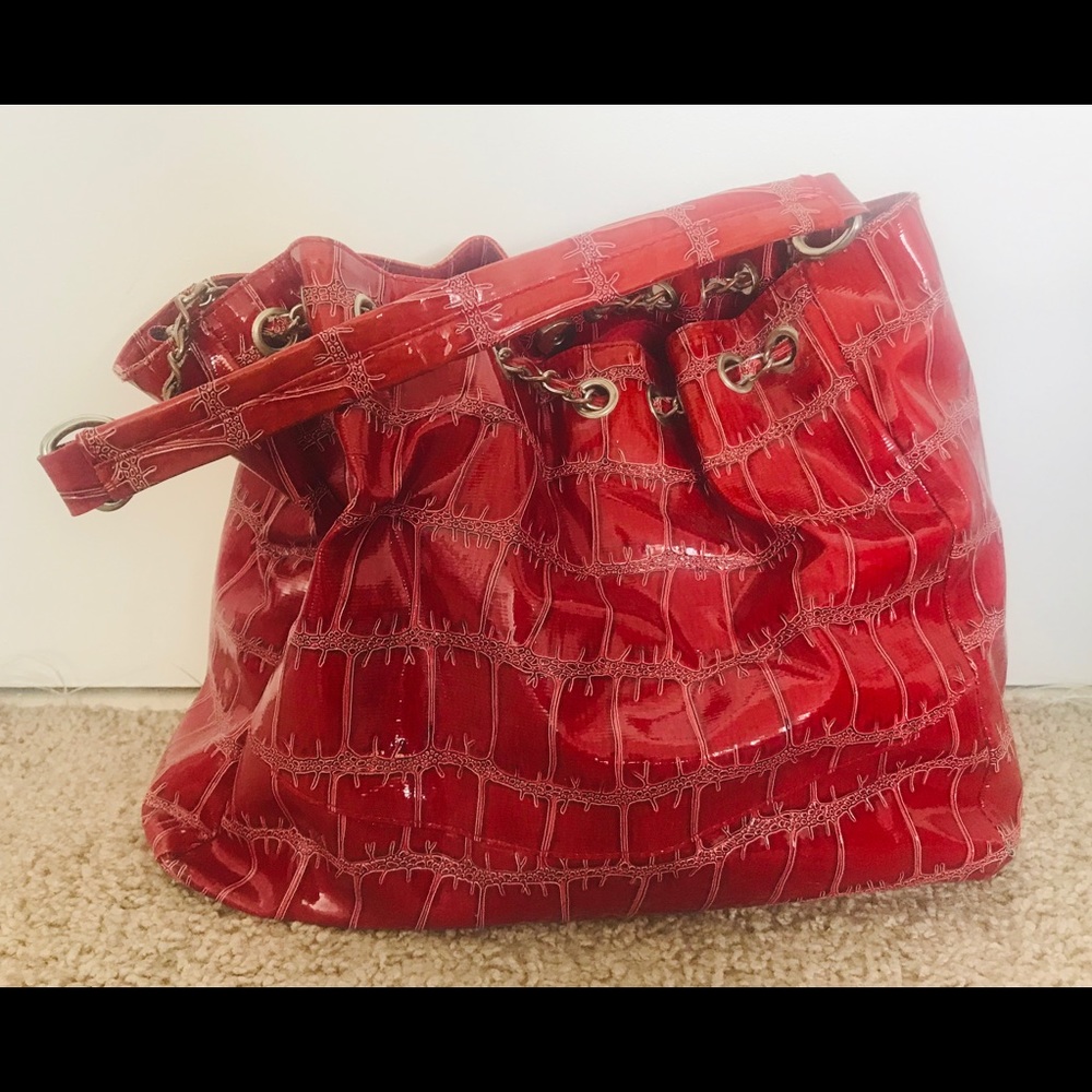 Red snake skin hand bag
